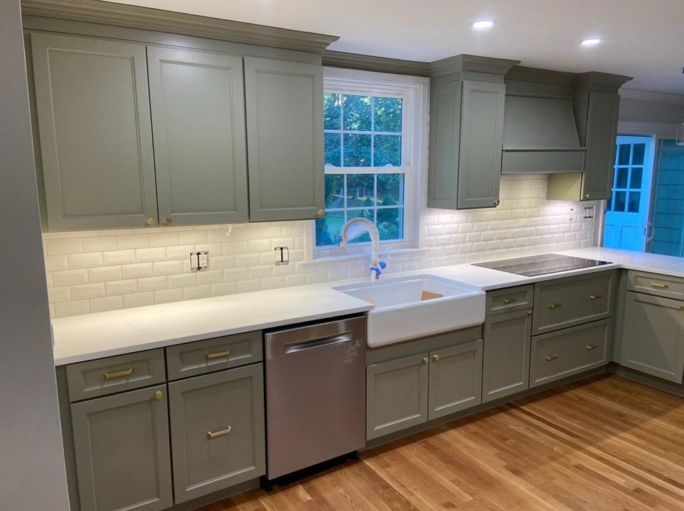 Finished kitchen cabinetry, countertop and farmhouse sink