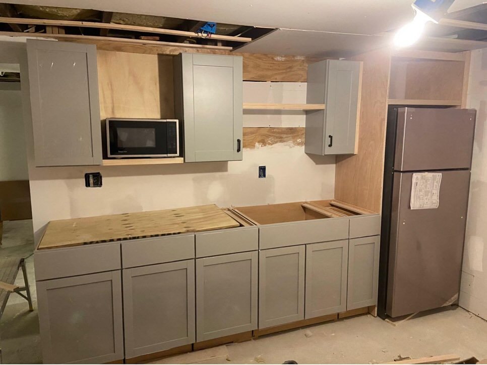 Kitchen cabinetry installation in progress